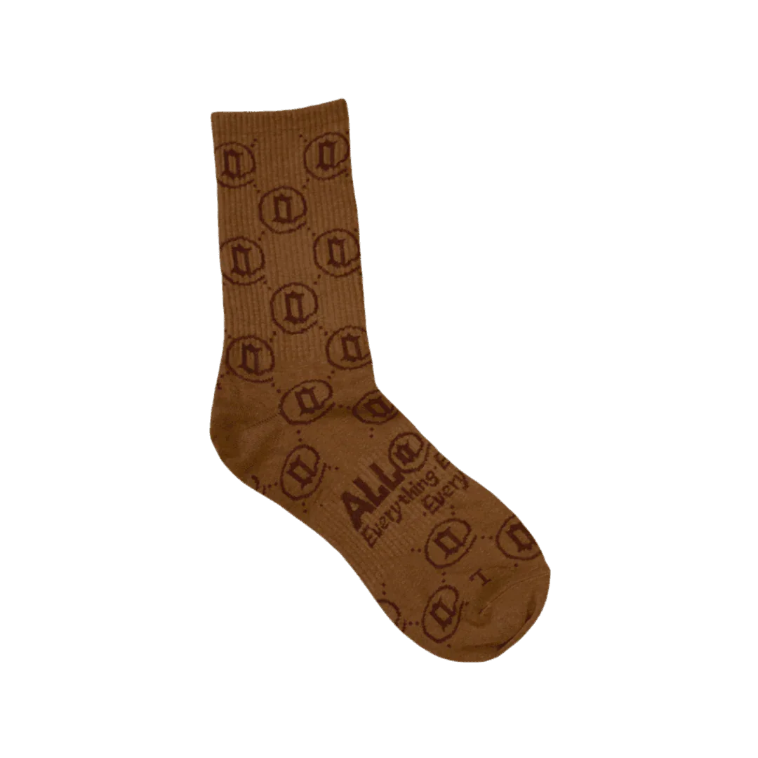 Brown crew sock with monogram pattern and text, stylish patterned cotton sock