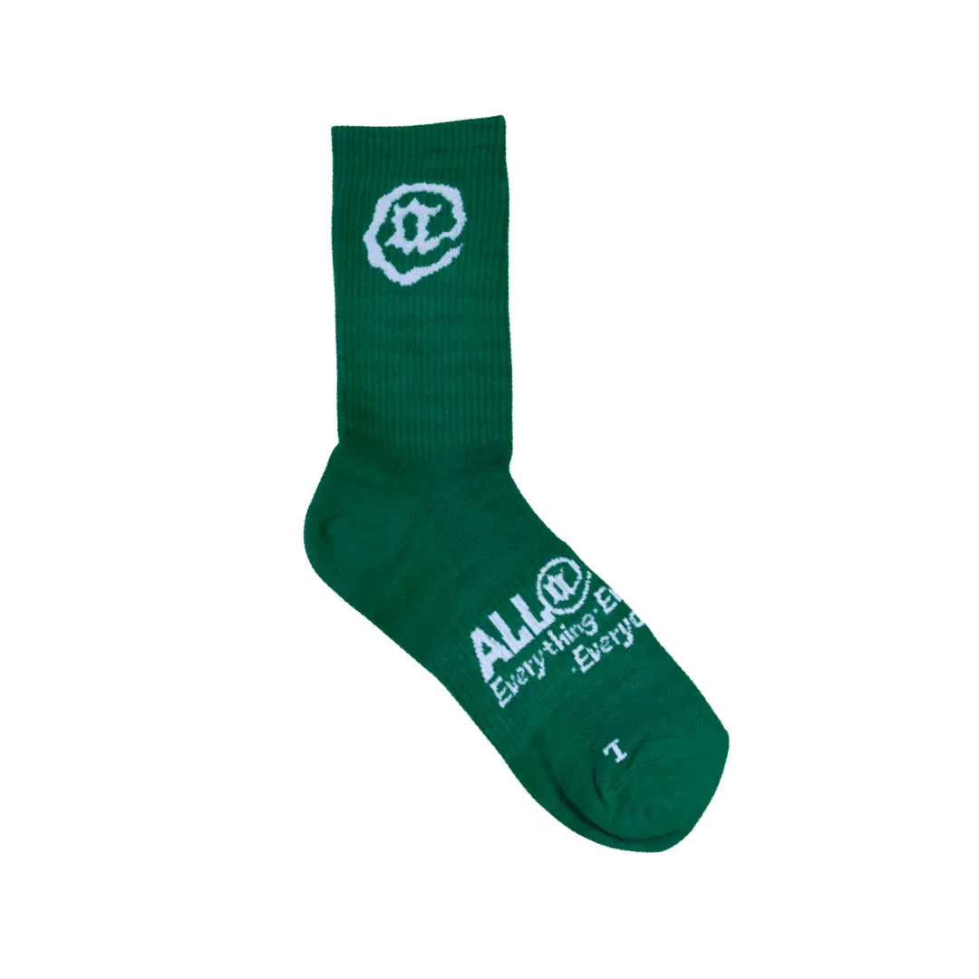 Green crew sock with white graphic logo and text, casual unisex novelty socks