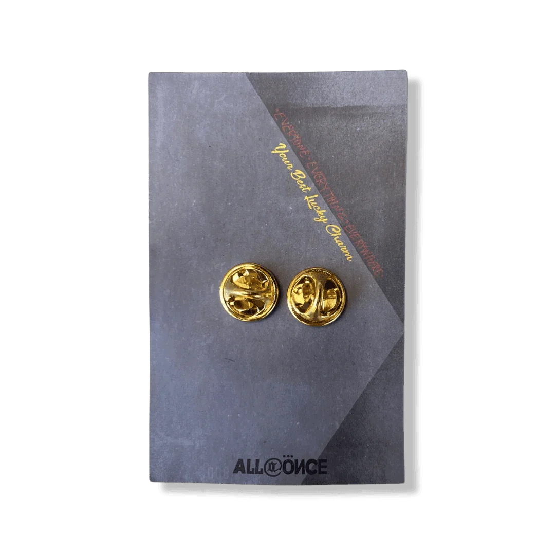 Gold enamel pin backs on black card, secure jewelry accessories