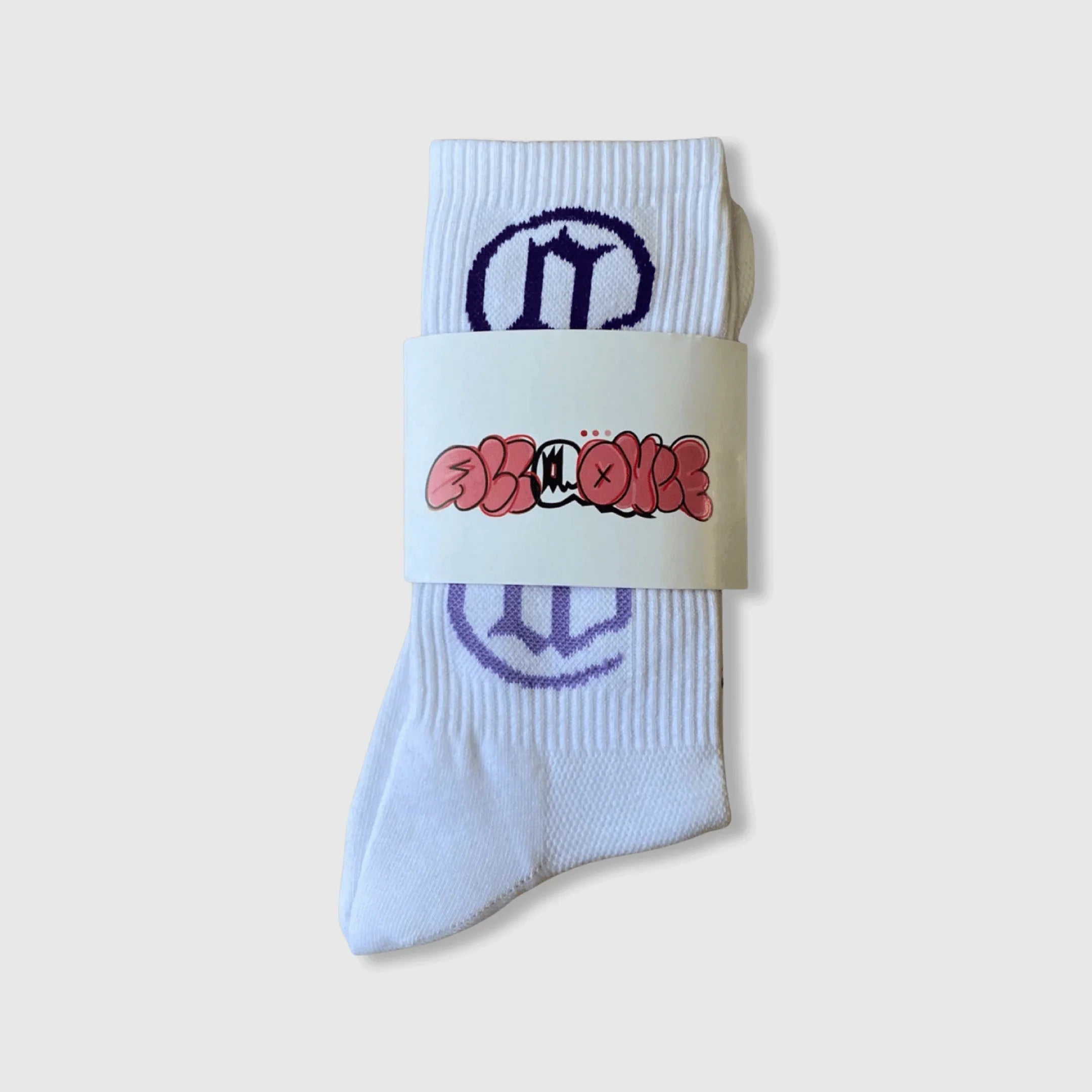 White crew socks with purple graphic design and illustrated label on plain background