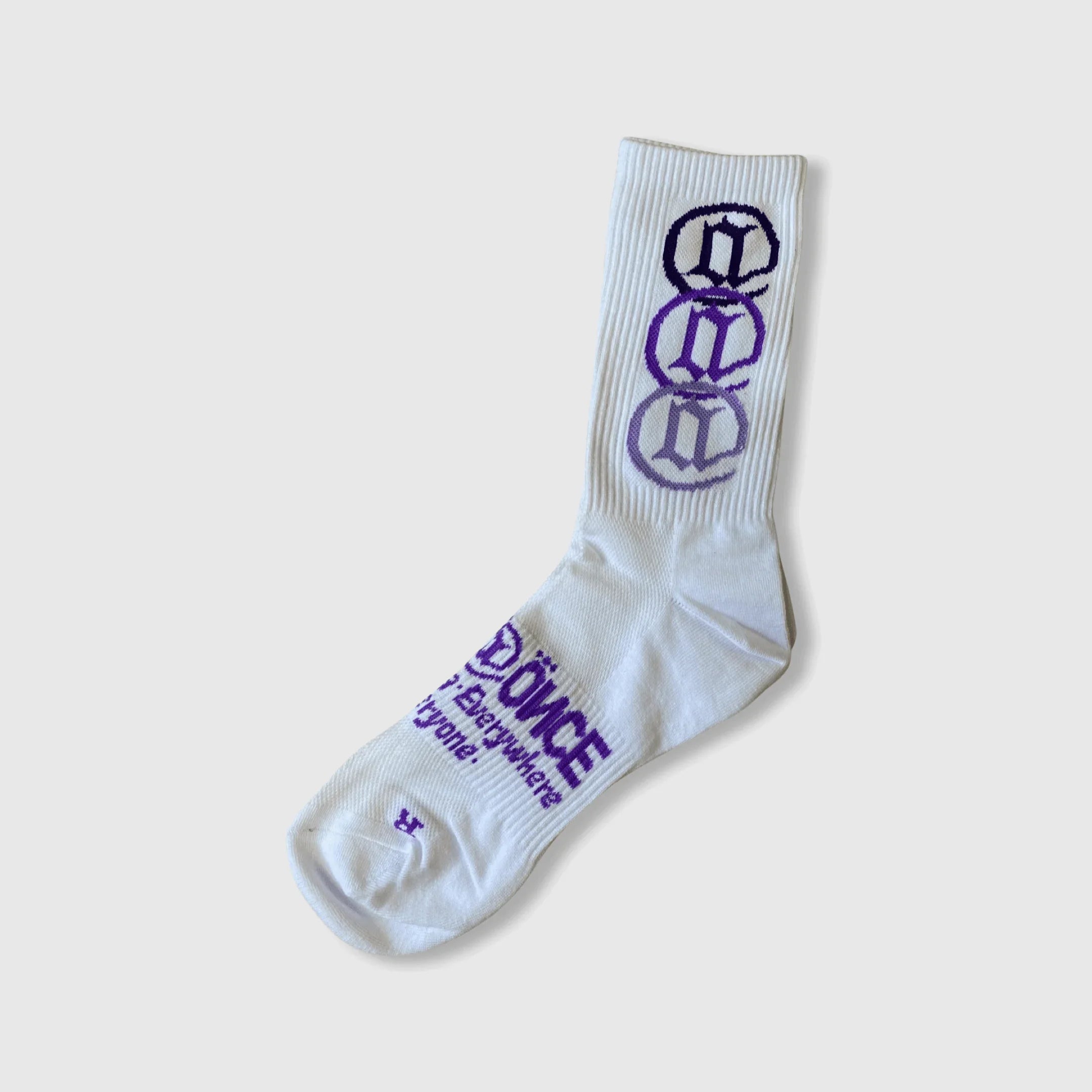 White crew sock with purple graphic symbols and text, casual streetwear accessory